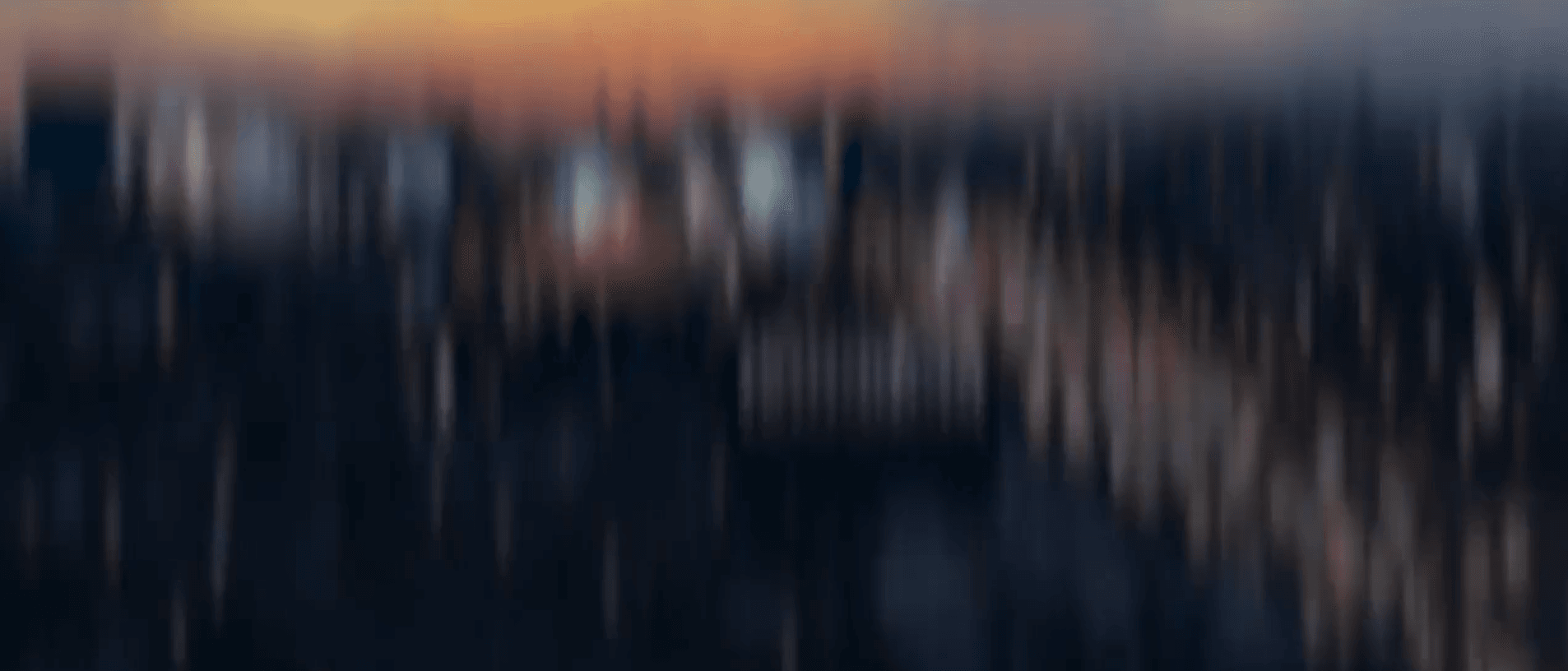 Background placeholder showing city of Wrocław at night